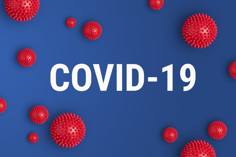 The World Health Organization (WHO) has officially designated the name COVID-19 for the Coronavirus disease, and it is presented on a blue background with the inscription "COVID-19."