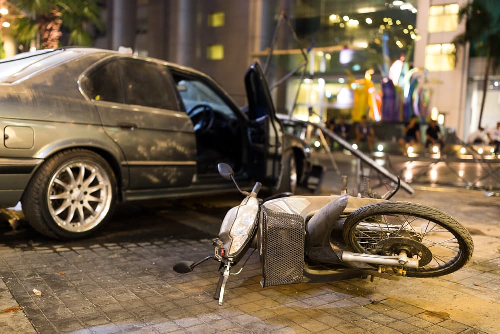  Hit-and-run driver, motorcycle accident involving a car.






